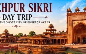 "Panoramic view of Fatehpur Sikri featuring Buland Darwaza, Mughal palaces, and historic courtyards during a day trip to Emperor Akbar's UNESCO World Heritage ghost city."