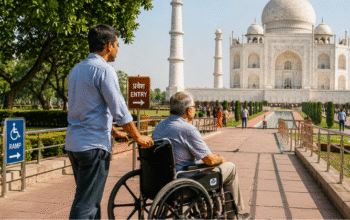 Wheelchair user visiting the Taj Mahal in Agra using accessible pathways with assistance during a comfortable sightseeing experience.