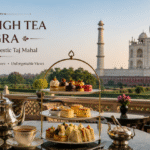 Luxury high tea in Agra overlooking the Taj Mahal with premium tea, gourmet pastries, elegant terrace seating, and panoramic monument views.