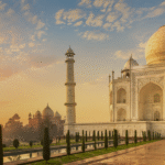 The Taj Mahal glowing in the soft light of sunrise and the golden hues of sunset in Agra, India